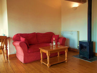 Comfortable sofa in Owl Cottage