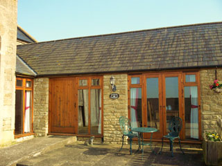 A pleasant place to sit outside Badger Cottage in the sunshine