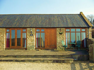 Owl Cottage with seating outside