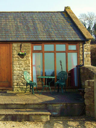 Spacious patio - a pleasant place to sit with good views